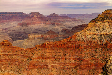 The Grand Canyon showcases the layers of rock visible as horizontal bands, showcasing the geological processes that have shaped the canyon over millions of years. Grand Canyon South Rim Arizona, USA