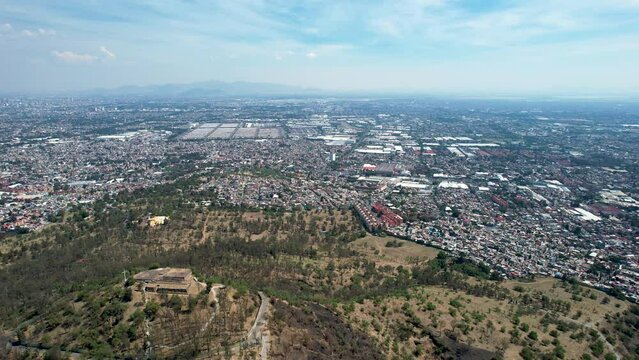 drone shot of east Mexico city over cerro de la estrella in iztapalapa