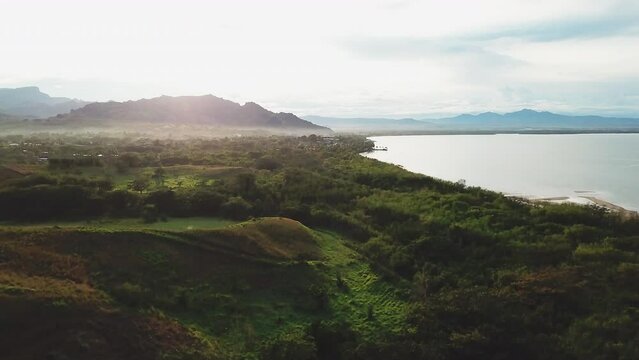 Nadi Fiji Bula holiday vacation island paradise aerial drone cinematic sunrise morning beautiful peaceful relaxing honeymoon adventure resort lagoon mountain beach jungle upward jib movement
