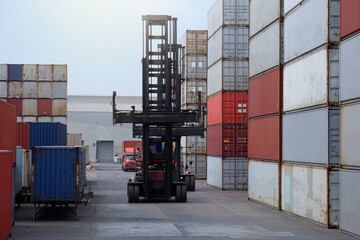 Tools used to lift industrial containers from cargo ships for export and import concept.
