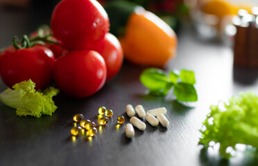 Dietary supplements, pills and capsules on a table healthy lifestyle