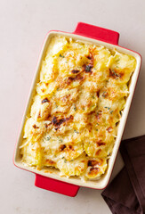 Potato casserole with cheese and cream. Vegetarian food. French food. Gratin dauphinois.