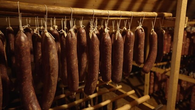 Dried meat is hung in a dryer.