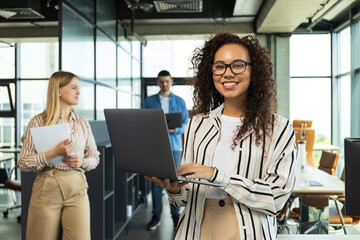 Young people working in office, coworking and office concept