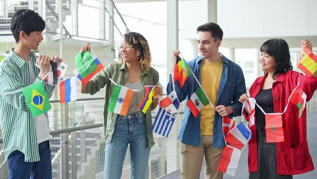Multinational group with bunting flags. International exchange.