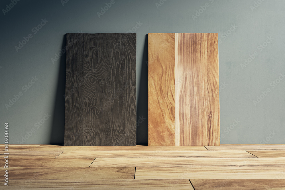 Poster two blank wooden panel leaning on concrete wall. design and mock up template. 3d rendering.