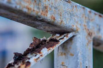 Close up of rusty on steel structure and white paint, Texture of surface metal from rust.