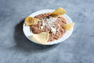 A view of a plate of refried beans.