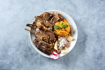 A top down view of a plate of goat barbacoa.