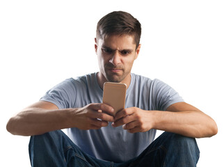 Shocked young man looking at his mobile phone seeing bad news or reading text message