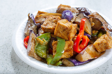 A view of an eggplant tofu entree.