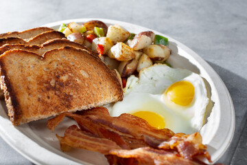 A view of a fried egg breakfast plate.