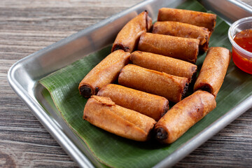A view of a tray of lumpia.