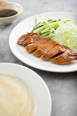 A view of a plate of Beijing duck.