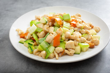 A view of a plate of cashew chicken.