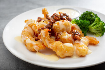 A view of a plate of honey walnut shrimp.