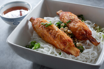 A closeup view of a bowl of chao tom.