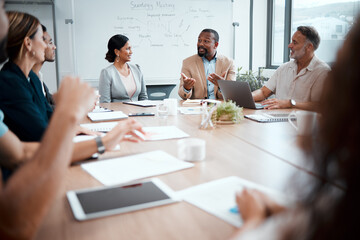 Business people, corporate and meeting in planning for strategy, brainstorming or sharing ideas at office. Group of employees in team discussion, collaboration or plan in conference at the workplace