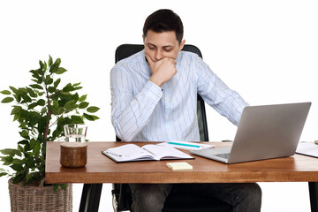 sad businessman using laptop, sitting on chair at desk