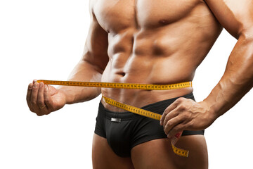 Fototapeta na wymiar Man measuring perfect shape of waist, healthy lifestyles concept.