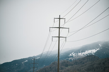 High voltage pole with cloud sky sunset in the countryside. Industrial background.