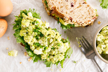 Healthy breakfast toast with avocado egg salad.