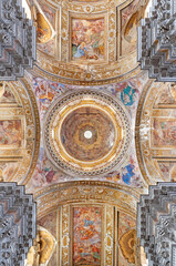 NAPLES, ITALY - APRIL 20, 2023: The frescoes in the cupola and nave in church Basilica di Santa...