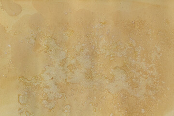 Old grunge paper with smudges texture background.