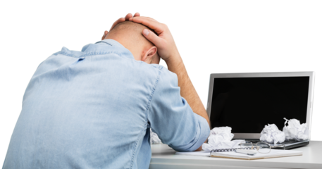 Businessman with stress working on office desk