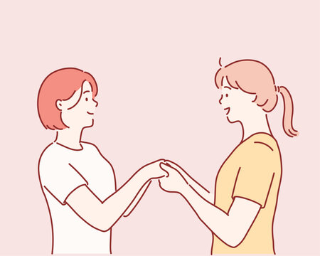 two girls holding each other by hands. Hand drawn style vector design illustrations.