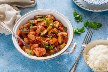 Spanish chicken stew with red wine, chorizo and vegetables
