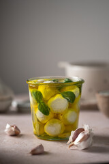 Labneh cheese balls in olive oil with basil
