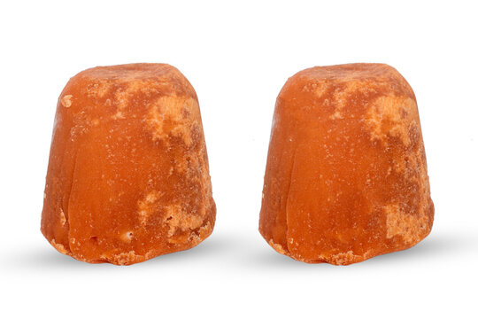 Organic Jaggery ( unrefined sugar ) isolated on white background.