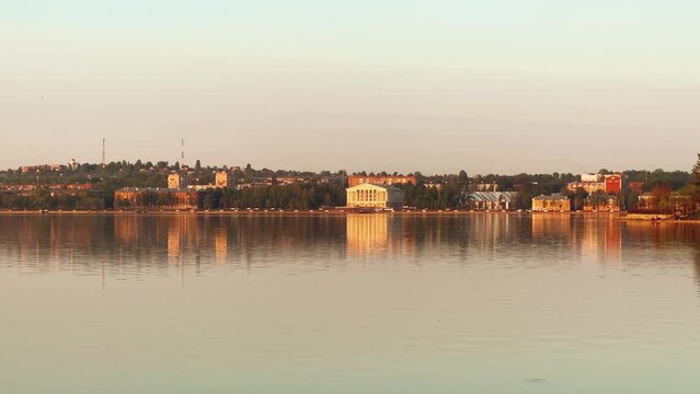 Picturesque view of the embankment of a small town at sunset. The birthplace of P.I. Tchaikovsky, the city of Votkinsk. Russia