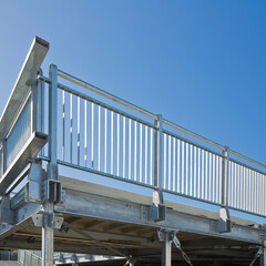 Detail of a new prefabricated railing structure, steel carpentry with pillars, steel beams and...