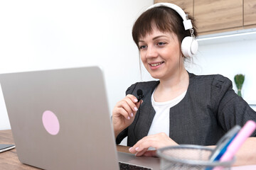 Call center service. Customer support female operator communicates with headset.