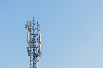 Antenna communication station tower that equipped with 3G and 4G and 5G receivers for distributing internet signal to both electronic connected devices. cell phone, computer and others on sky
