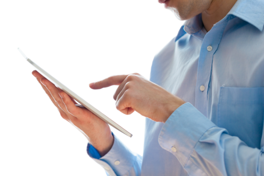 A young business man holding a tablet pc