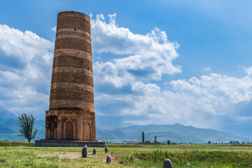 Fototapeta premium Kyrgyzstan, Chui region, Burana village. Burana tower and balbals: nomadic tribal monuments of Central Asia.