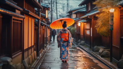 Fototapeta premium Pretty japanese woman wearing kimono walking in old town Kyoto holding umbrells AI generated