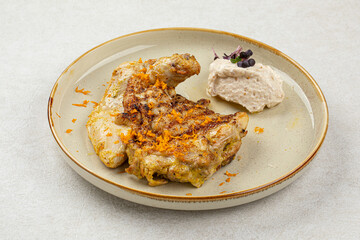 Portion of gourmet cooked chicken with nut cream