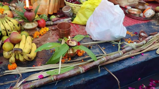 burning oil lamp with offerings during holy rituals at festival from different angle video is taken on the occasions of chhath festival which is used to celebrate in north india on Oct 28 2022.