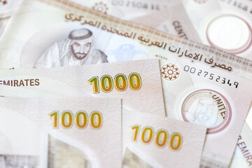 UAE dirhams, new paper banknotes of one thousand, closeup