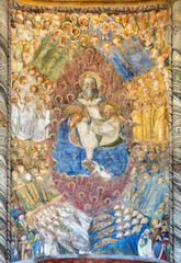 NAPLES, ITALY - APRIL 23, 2023: The fresco of  Corronation of Virgin Mary in the church Chiesa di San Giovanni a Carbonara by Leonardo da Besozzo from 15. cent. 