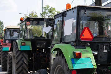 Farmers blocked traffic with tractors during a protest - obrazy, fototapety, plakaty