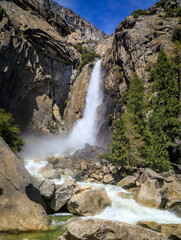 Naklejka na ściany i meble Close up of Lower Yosemite Falls full of snowmelt water in the spring in Yosemite National Park, Sierra Nevada mountain range in California, USA