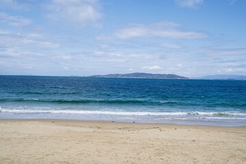 Fototapeta na wymiar Shiga Island as seen from the beach in Itoshima