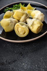 artichoke canned food healthy meal food snack on the table copy space food background rustic top view keto or paleo diet veggie vegan or vegetarian food