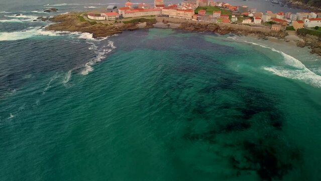 Blue Sea Revealed A Coastal Medieval Town On Mediterranean Coast In Caion, Galicia, Spain. Tilt-up