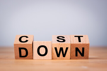 Now every business try to reduce cost to get more profit concept for flipping wooden block cubes...